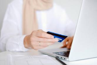 person using online payment solutions to make purchase