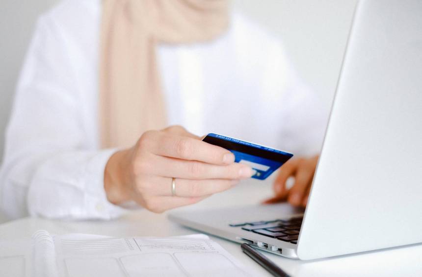 person using online payment solutions to make purchase